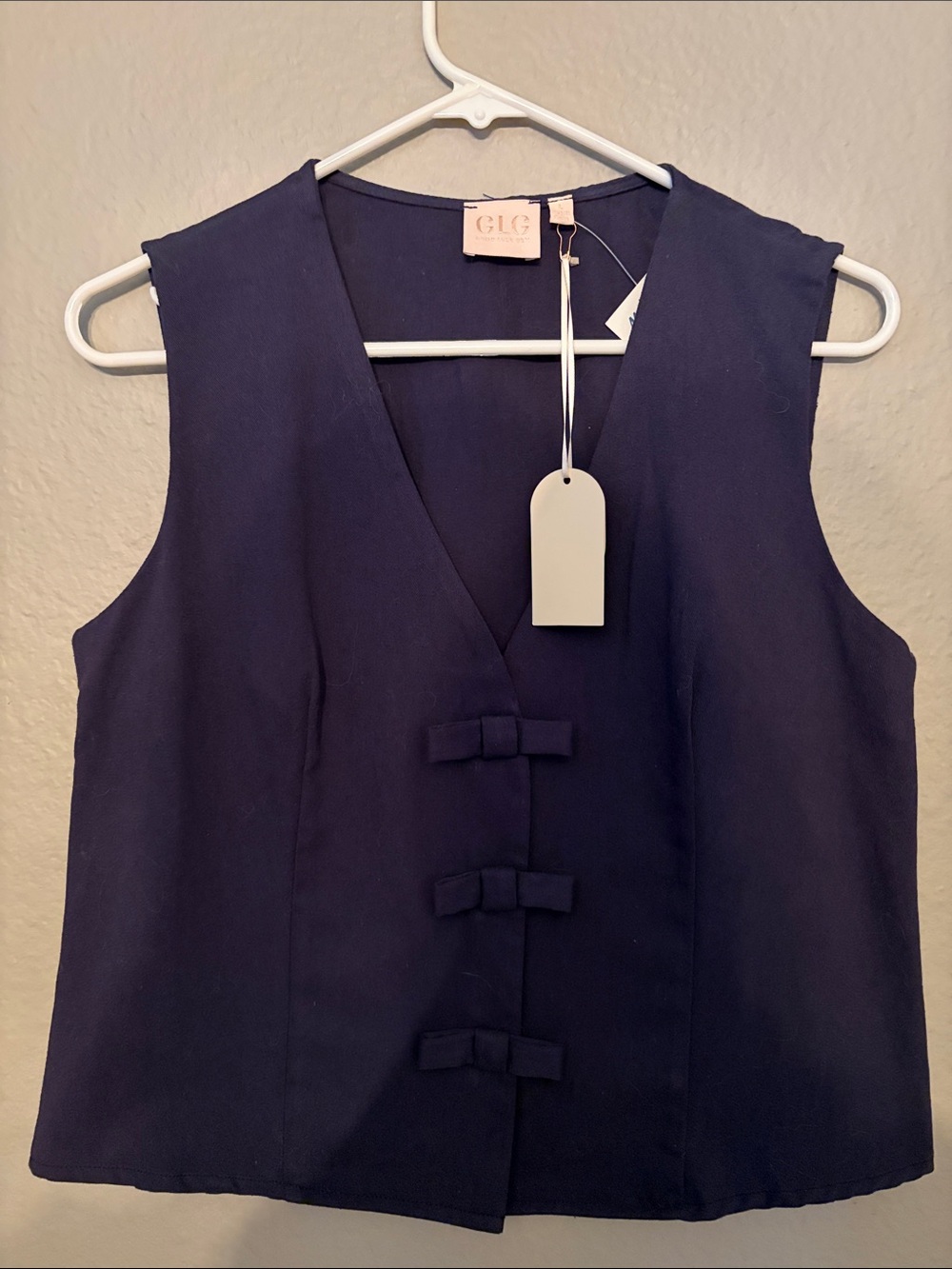 Good Luck Gem Navy Sleeveless V-Neck Top with Front Bow Tabs